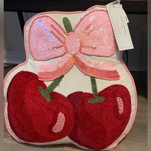 Cupcakes & Cashmere cherry and bow pillow